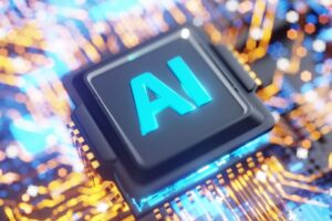 Close-up of a computer chip with AI text glowing in blue.