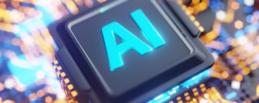 Close-up of a computer chip with AI text glowing in blue.